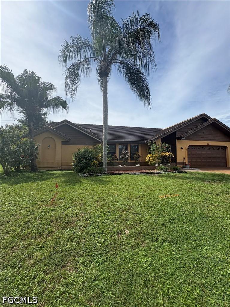 688 Morningmist Ln., Lehigh Acres, FL 33974