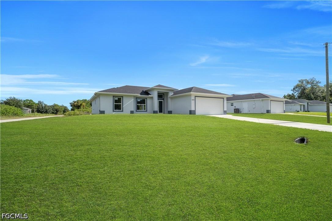 1021 Pilgrim St., Lehigh Acres, FL 33974