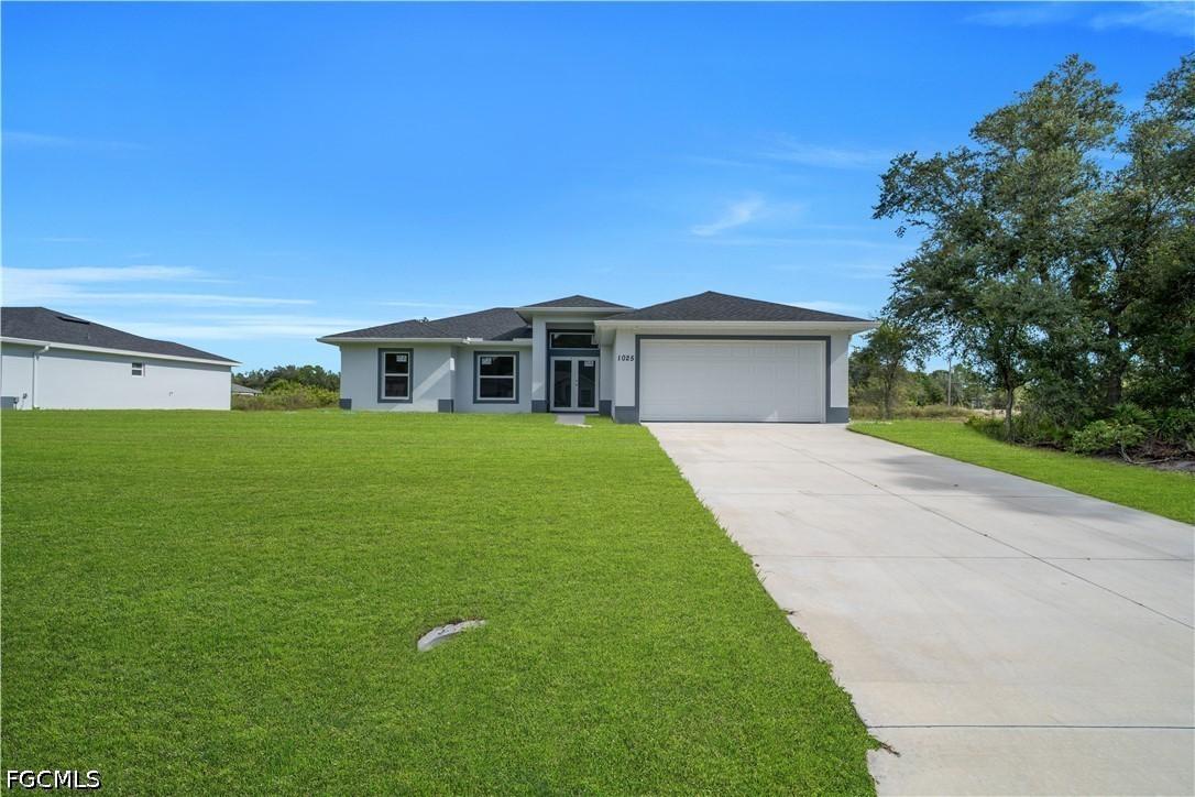 1025 Pilgrim St., Lehigh Acres, FL 33974