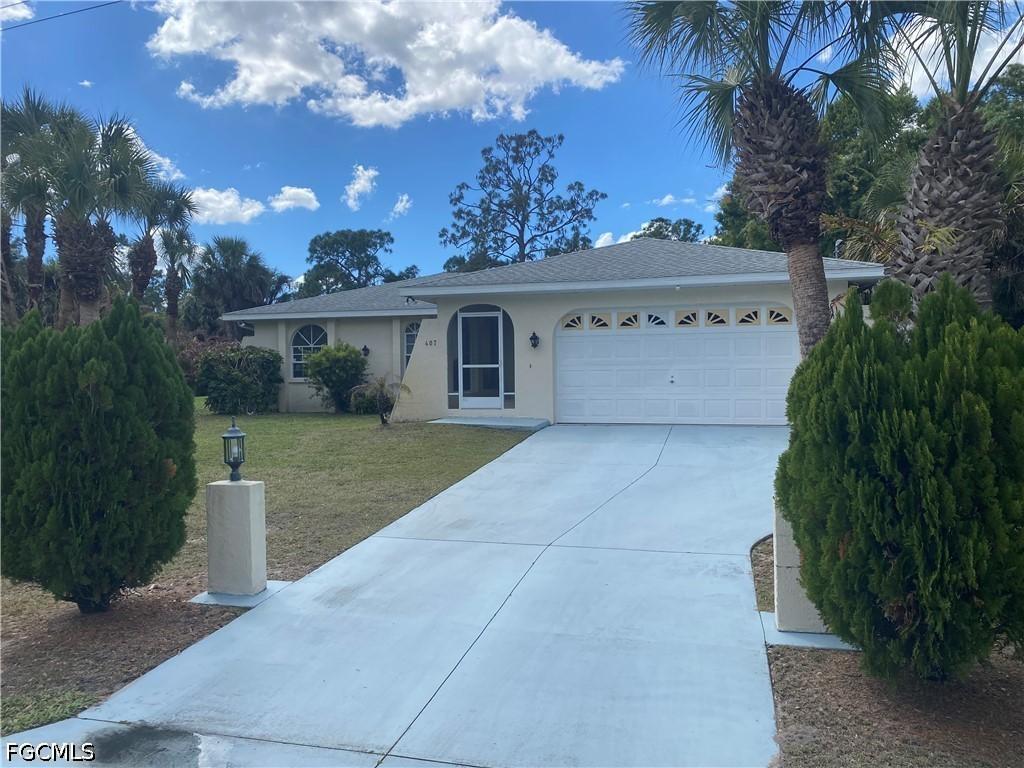 407 Plumosa Ave., Lehigh Acres, FL 33972
