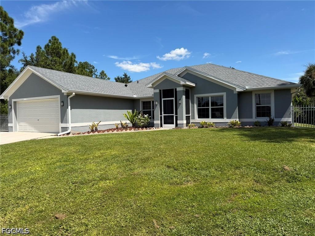 702 Calvin Ave., Lehigh Acres, FL 33972