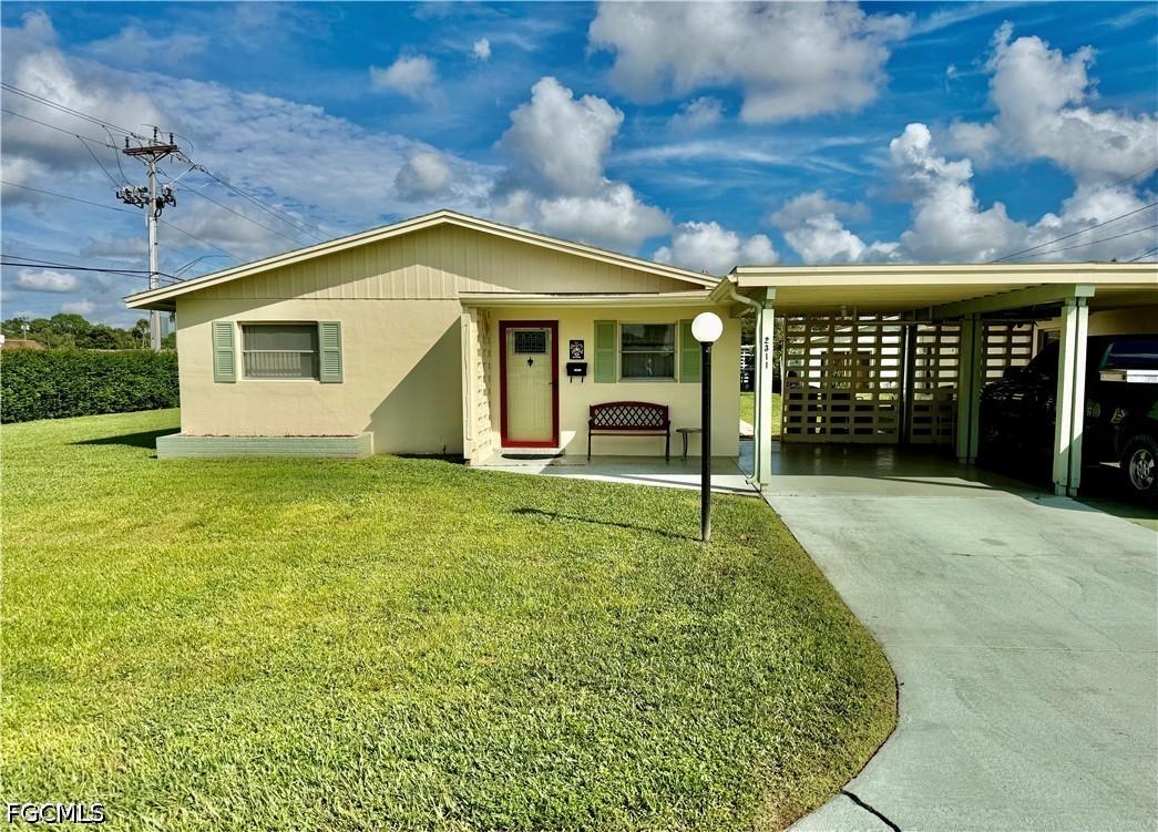 2311 Narcissus Ct., Lehigh Acres, FL 33936