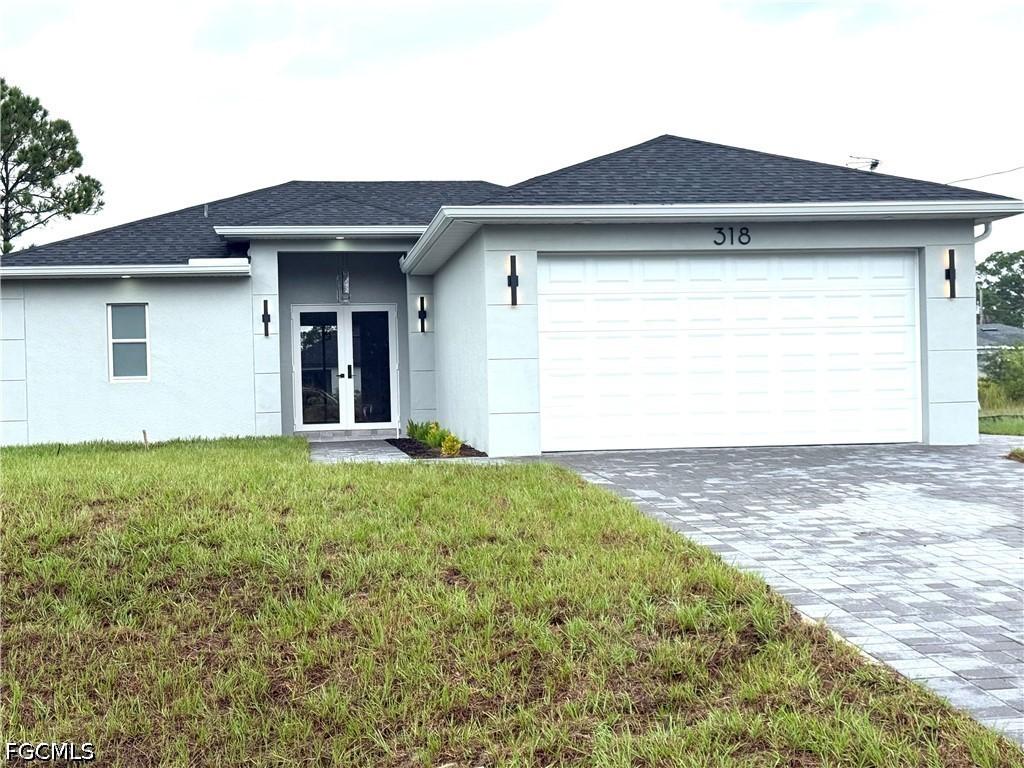 318 Genoa Ave., Lehigh Acres, FL 33974