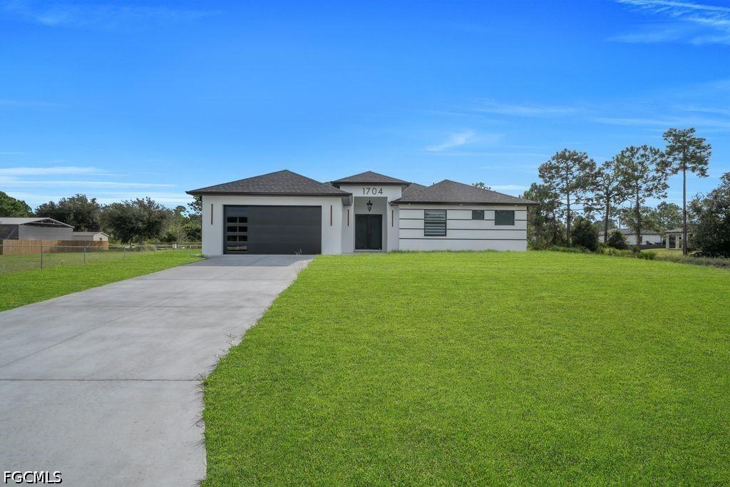 1704 Clayton Ave., Lehigh Acres, FL 33972