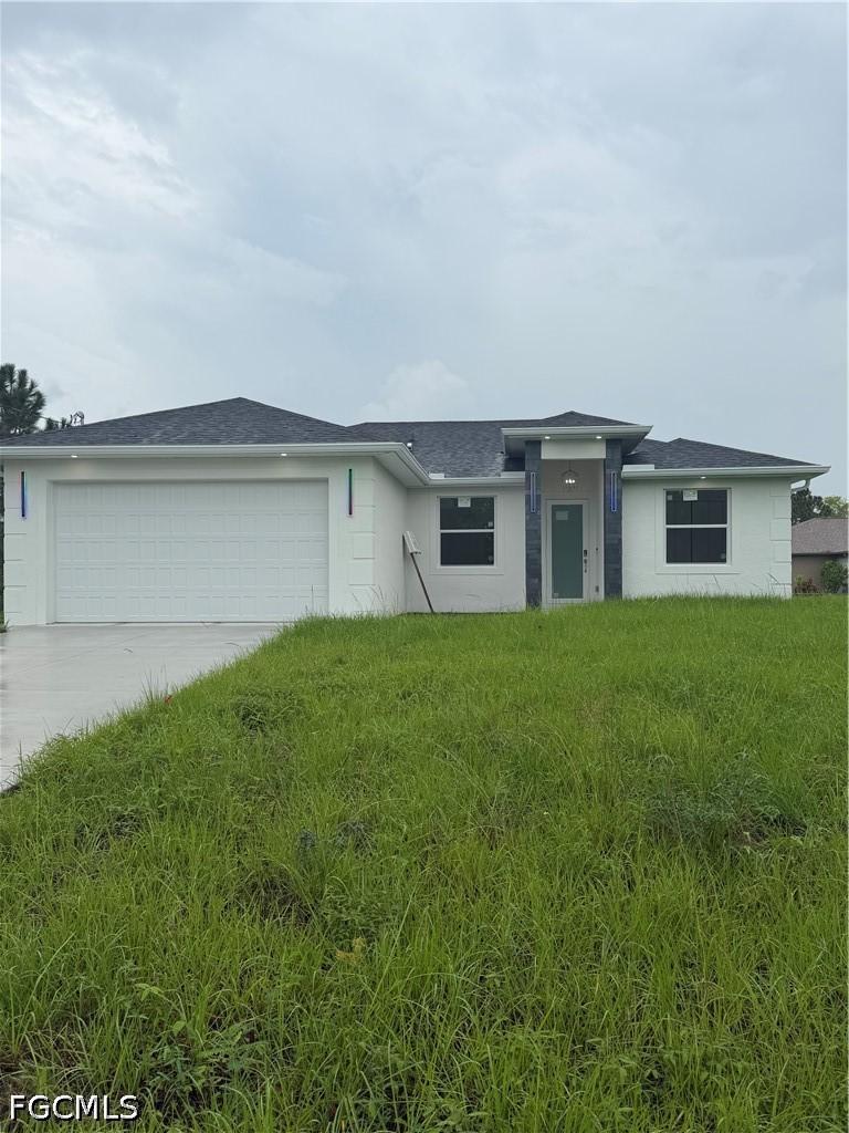 426 Jaipur Dr., Lehigh Acres, FL 33974