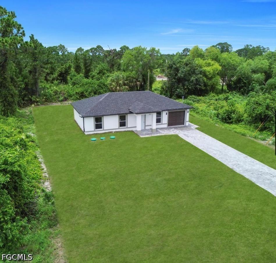 382 Mcarthur Blvd., Lehigh Acres, FL 33974