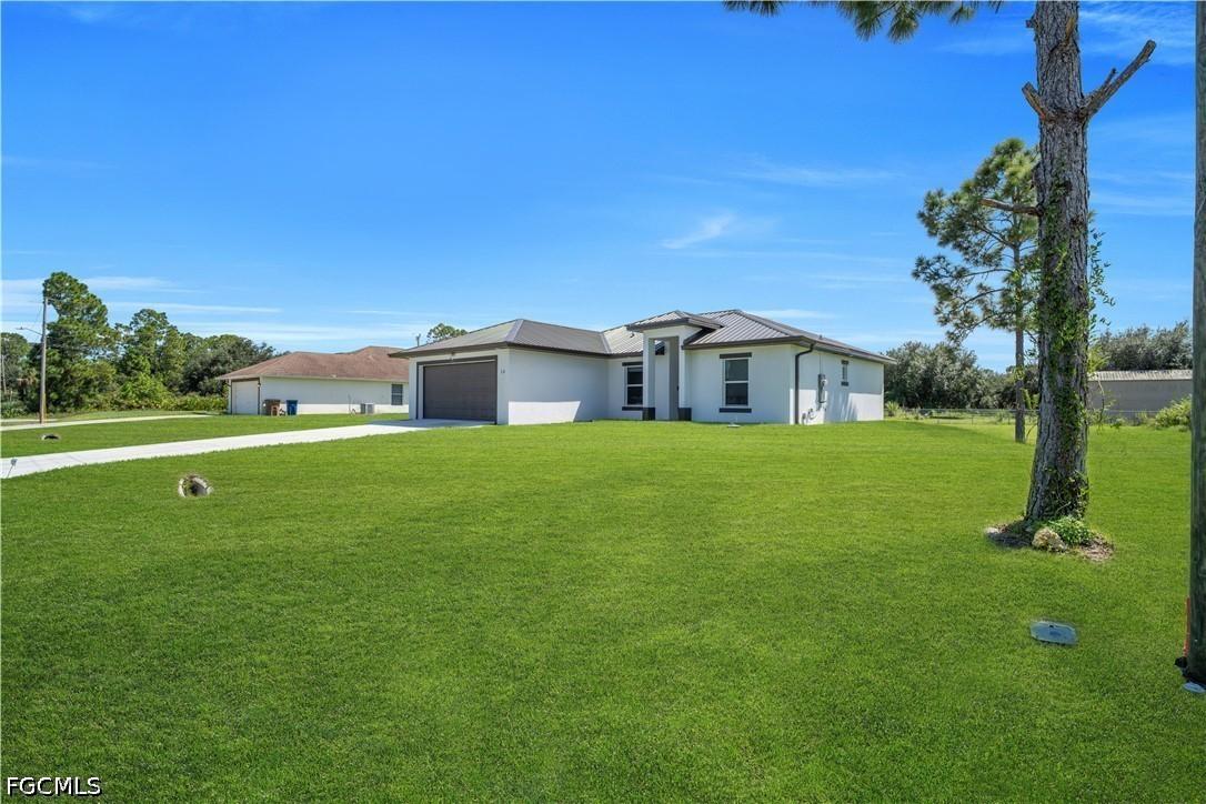 13 W 9th St., Lehigh Acres, FL 33972