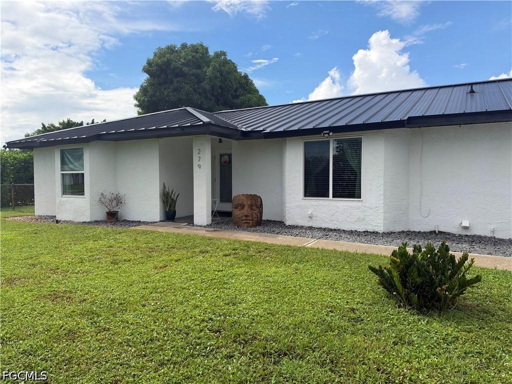 279 Ground Dove Cir., Lehigh Acres, FL 33936