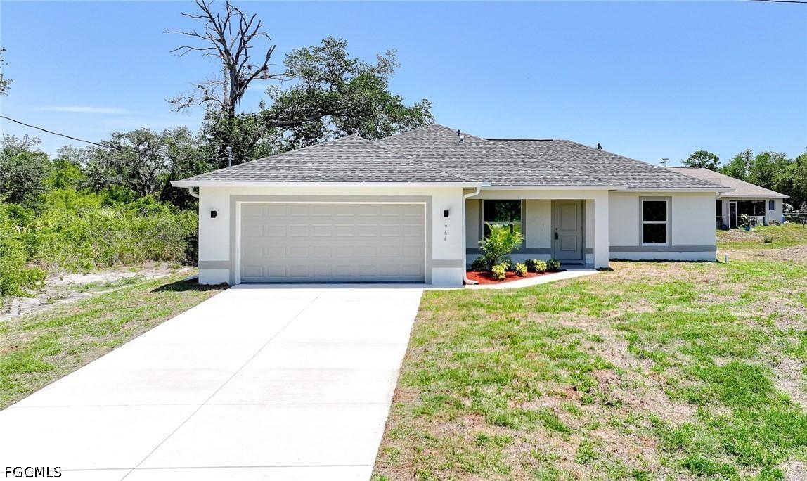 1964 Leghorn St., Lehigh Acres, FL 33972