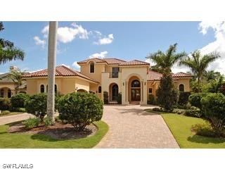 390 Putter Point Dr., Naples, FL