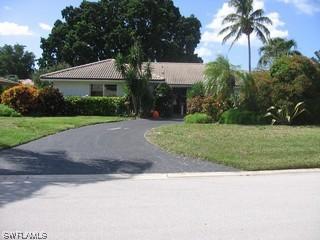 4865 Whispering Pine Way, Naples, FL 34103