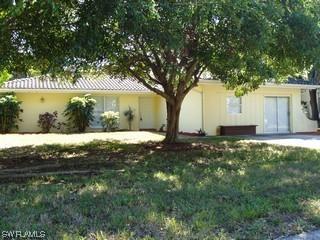 1212 Baldwin Pl., Lehigh Acres, FL 33936