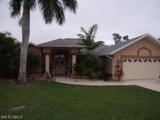 6184 Woodstone Dr., Naples, FL 34112