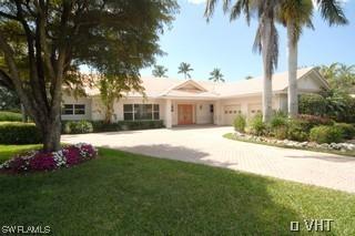 330 Springline Dr., Naples, FL