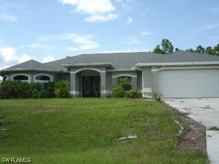 1047 Pilgrim St., Lehigh Acres, FL
