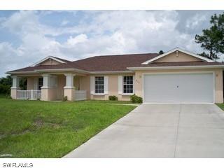 311 Leruth Ave., Lehigh Acres, FL 33974