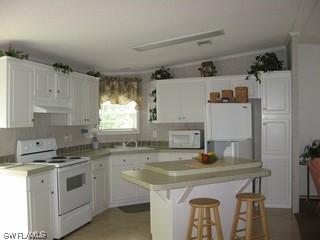 60 Moon Bay St., Naples, FL