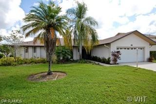 104 Fleur De Lis Ln., Naples, FL 34112