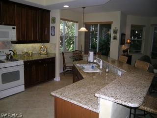 2000 Tarpon Bay Dr. #101, Naples, FL 34119