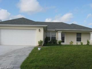 452 Zimmerman Ave., Lehigh Acres, FL 33974