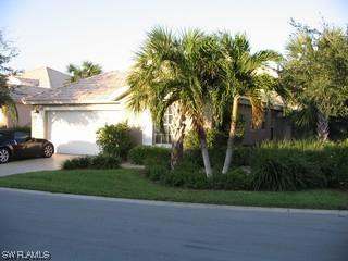 1555 Whispering Oaks Cir., Naples, FL 34110