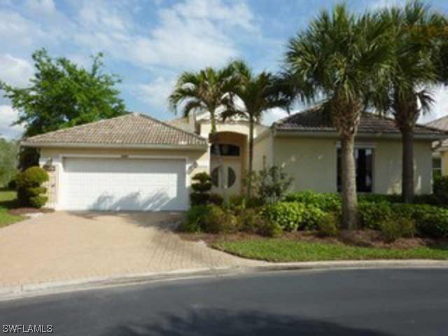 1567 Whispering Oaks Cir., Naples, FL