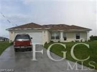 407 Pickford Ave., Lehigh Acres, FL 33974