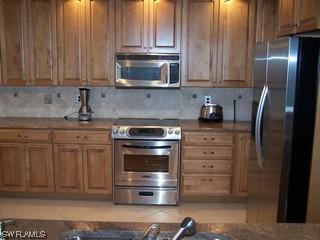 665 Wiggins Lake Dr. #102, Naples, FL