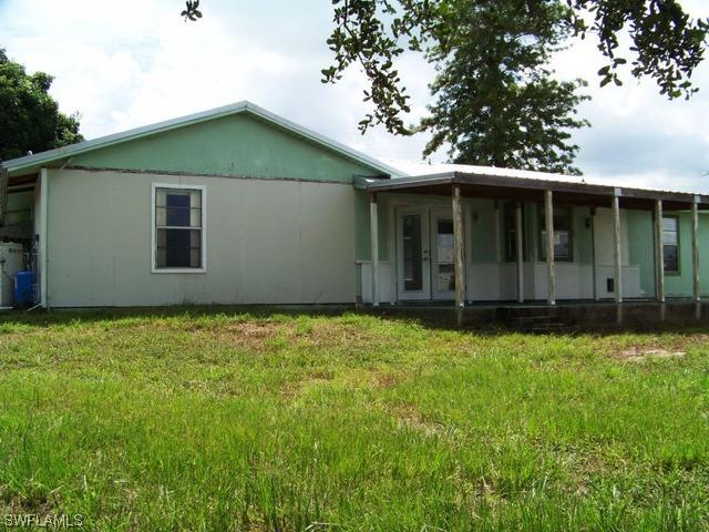 302 Floyd Ave., Lehigh Acres, FL 33976