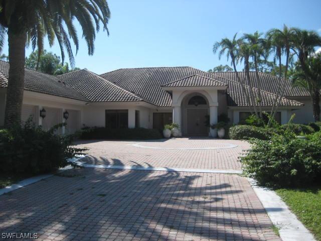 13101 Bald Cypress Ln., Naples, FL 34119