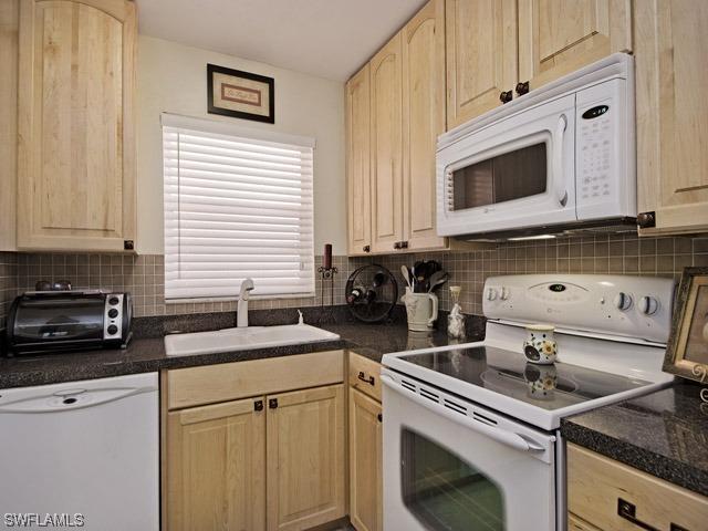 101 Forest Lakes Blvd. #203, Naples, FL