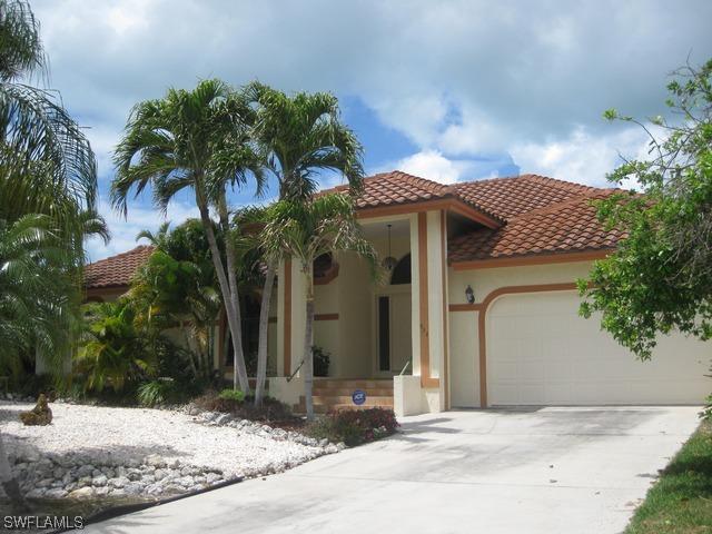 938 Joy Cir., Marco Island, FL