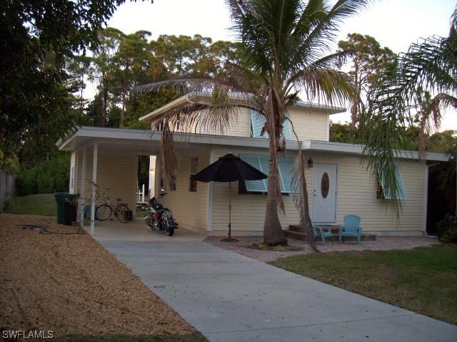 1081 Hollygate Ln., Naples, FL