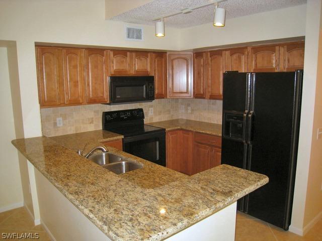 1220 Wildwood Lakes Blvd. #208, Naples, FL 34104