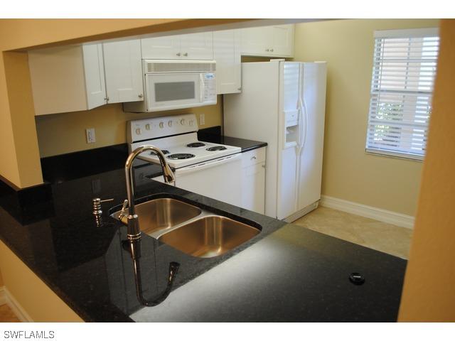 1702 Kings Lake Blvd. #103, Naples, FL 34112