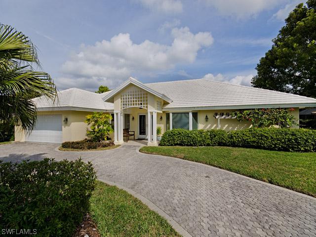 6596 Ridgewood Dr., Naples, FL 34108