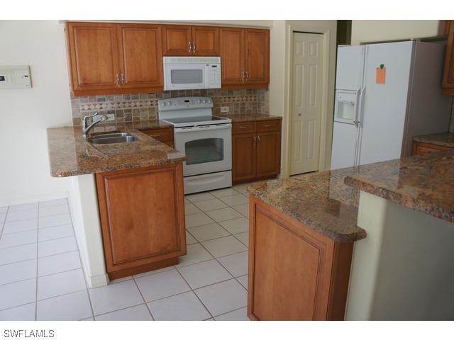 9821 Clear Lake Cir., Naples, FL 34109