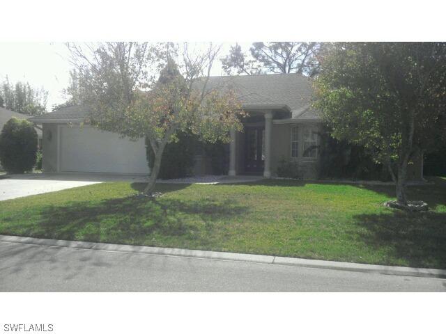 6168 Woodstone Dr., Naples, FL