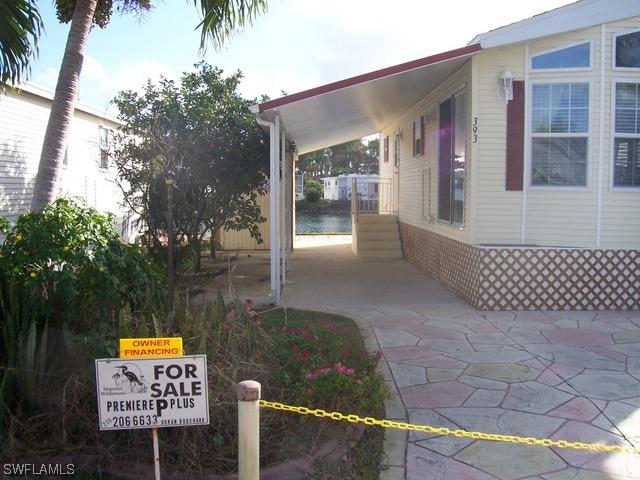 393 Leopard Ln., Naples, FL 34114