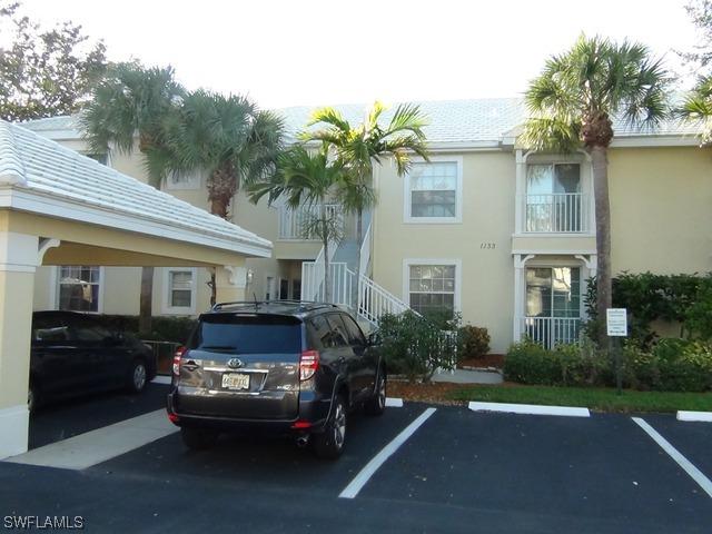 1133 Sweetwater Ln., Naples, FL