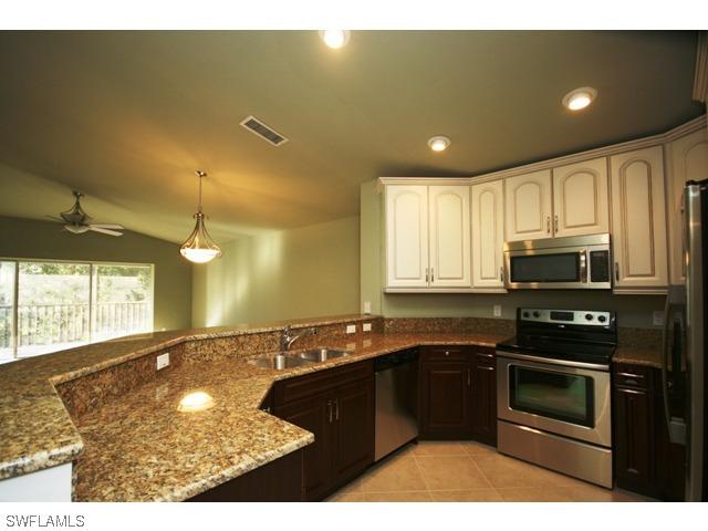 1450 Misty Pines Cir., Naples, FL