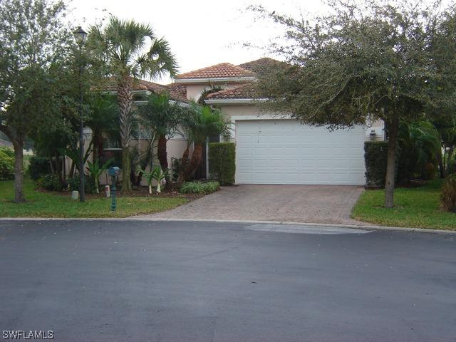 7679 Berkshire Pines Dr., Naples, FL 34104