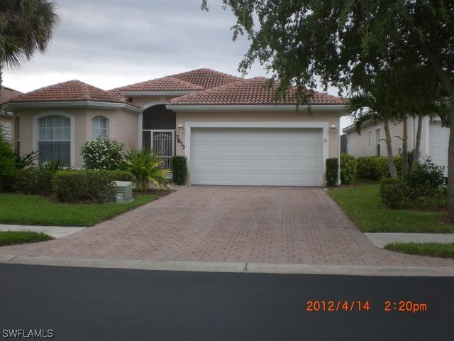 7633 Berkshire Pines Dr., Naples, FL 34104