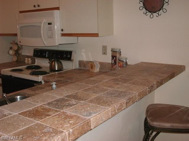 7260 Coventry Ct. #402, Naples, FL