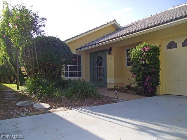 11049 Longshore Way, Naples, FL 34119