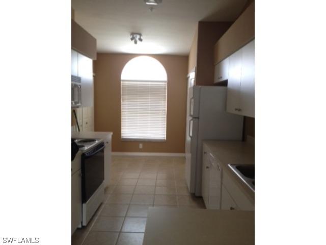 4910 Cougar Ct. #201, Naples, FL 34109