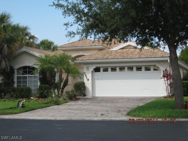 7519 Berkshire Pines Dr., Naples, FL 34104