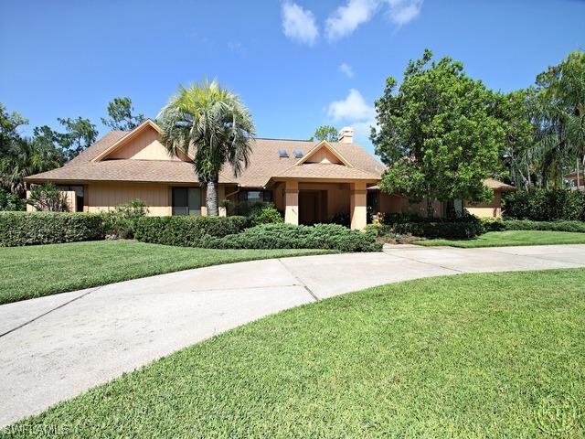 12975 Bald Cypress Ln., Naples, FL 34119