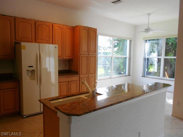 1323 Barnstable Ct., Naples, FL 34104