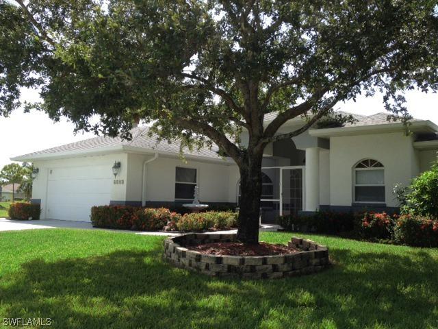 6197 Woodstone Dr., Naples, FL